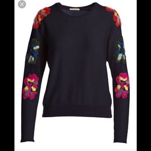 Chloe wool-blend sweater with Flowers embroidery.